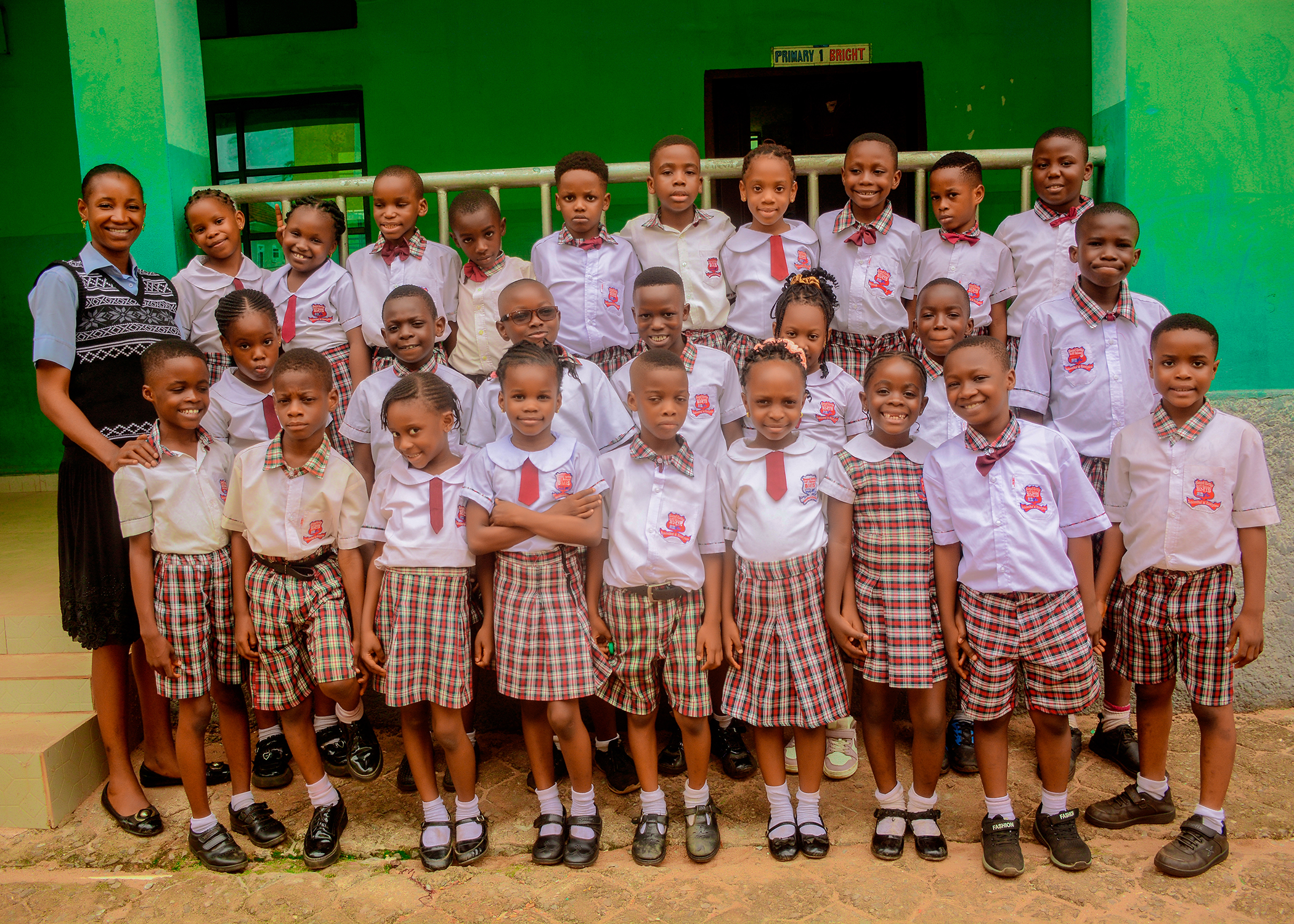 Blessed Martins primary students with teacher